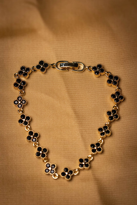 Gold Floral Bracelet with Black Stones | Elegant Women’s Jewelry