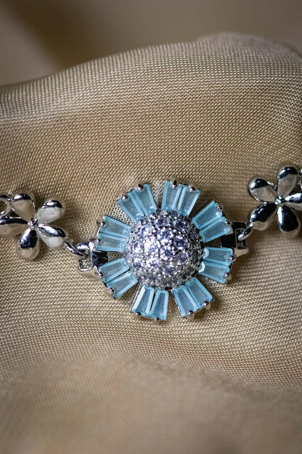 Floral Silver Bracelet with Aqua Blue Stones | Elegant Crystal-Studded Jewelry
