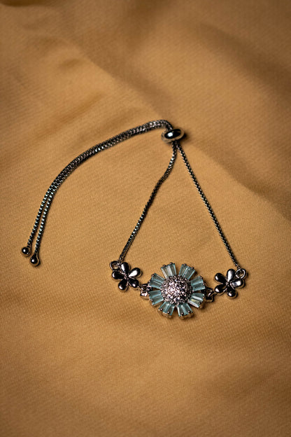 Floral Silver Bracelet with Aqua Blue Stones | Elegant Crystal-Studded Jewelry