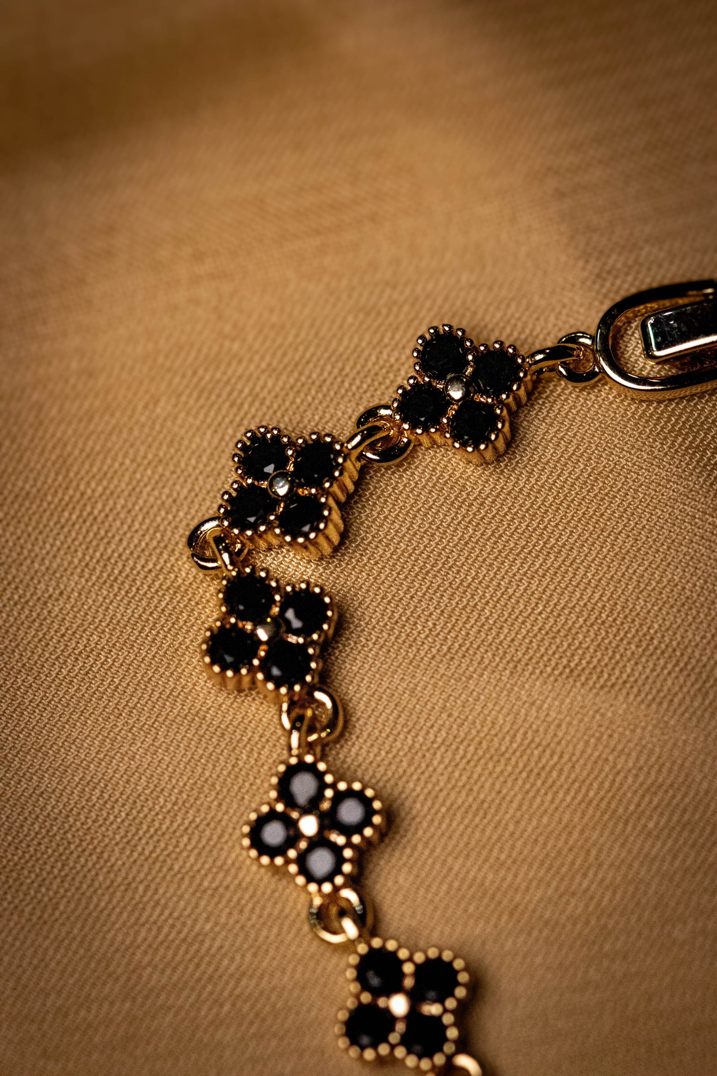 Gold Floral Bracelet with Black Stones | Elegant Women’s Jewelry
