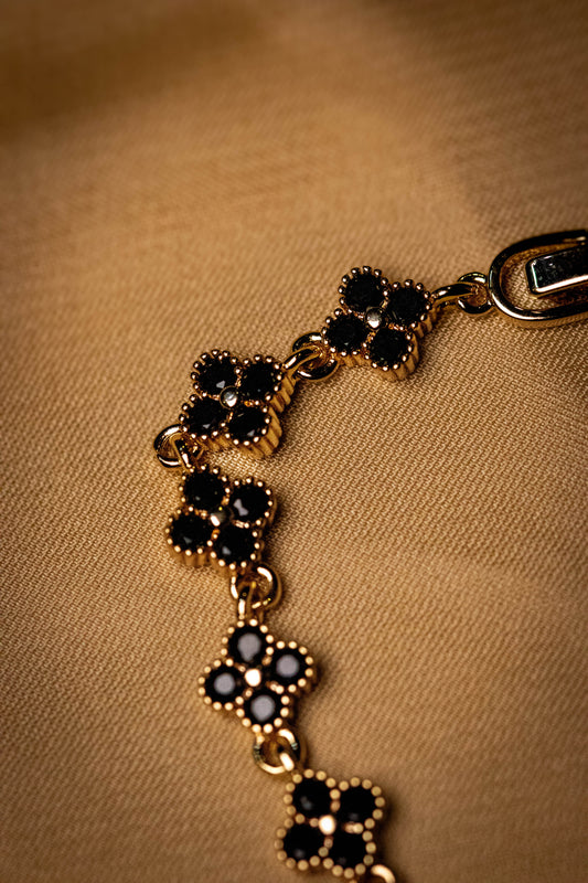 Gold Floral Bracelet with Black Stones | Elegant Women’s Jewelry